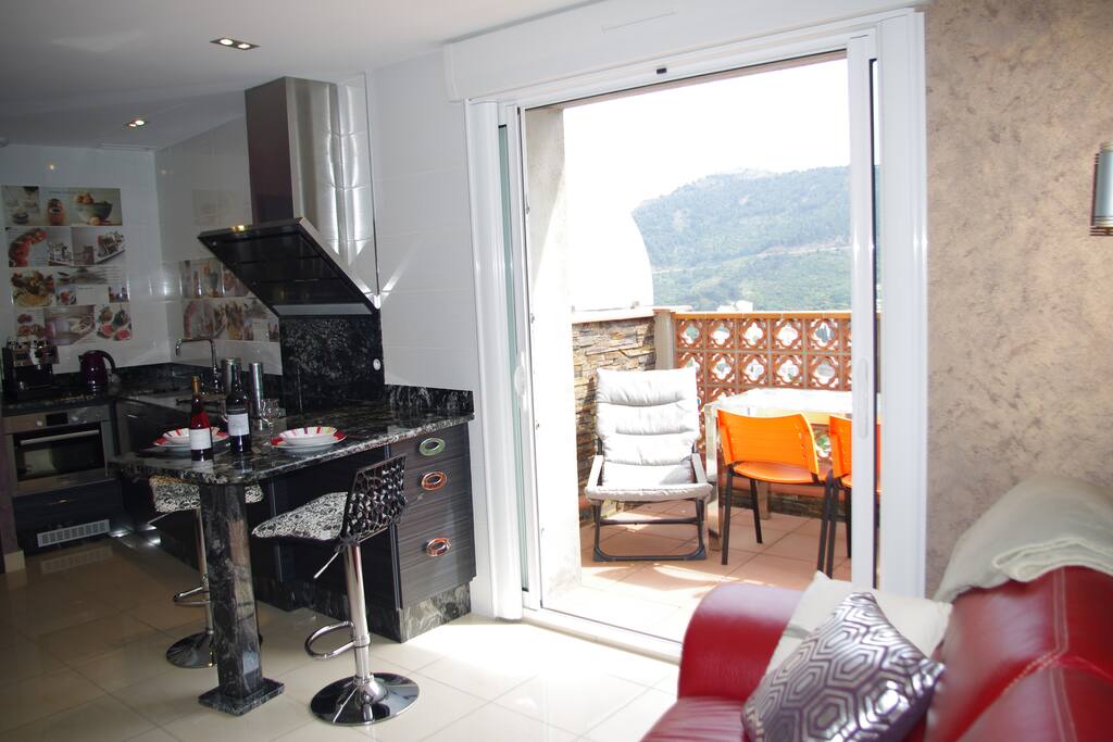 ouverture totale sur l'extérieur terrasse plein sud