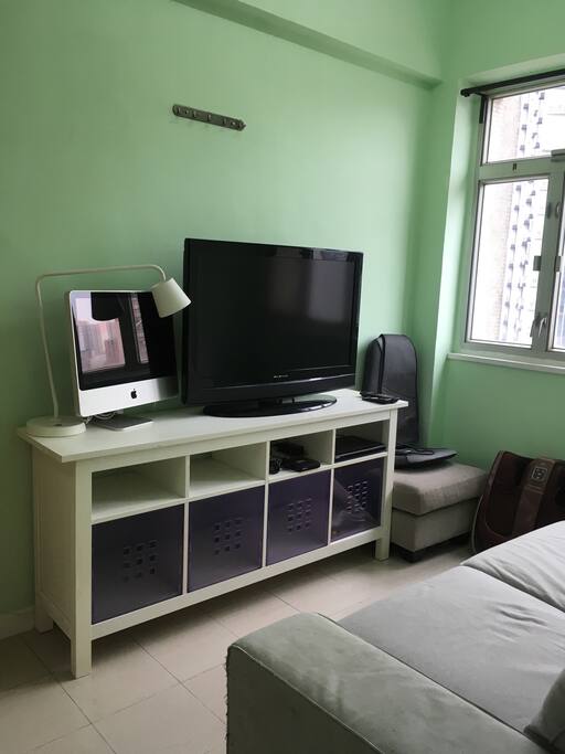 Big sofa, TV and massage machines in living room