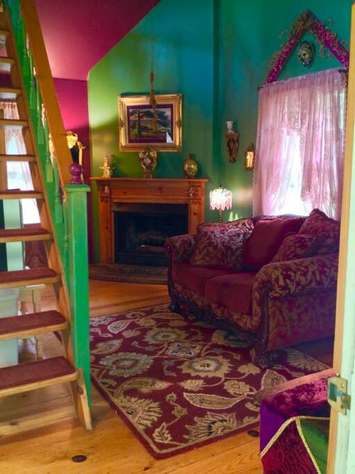 Living room with stairs to loft
