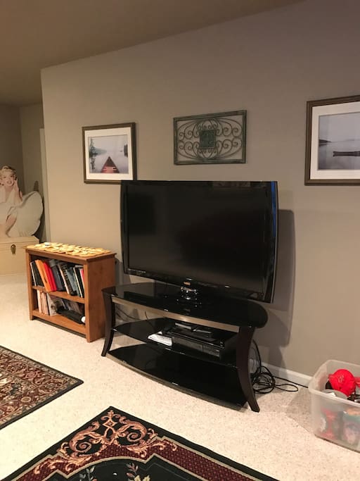 large screen TV in basement family room