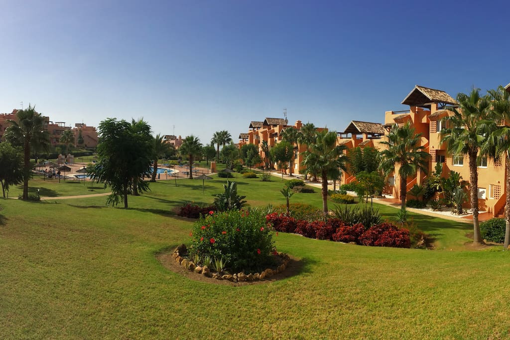 South facing terrace with spectacular views over the pool and gardens