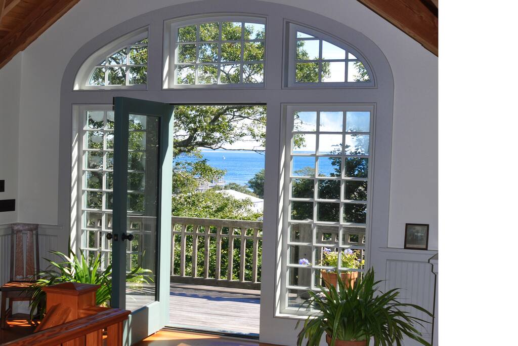 Bay vistas looking South. This door leads out to the deck off of the Living / Dining / Kitchen. The grill on this deck is easily accessible.