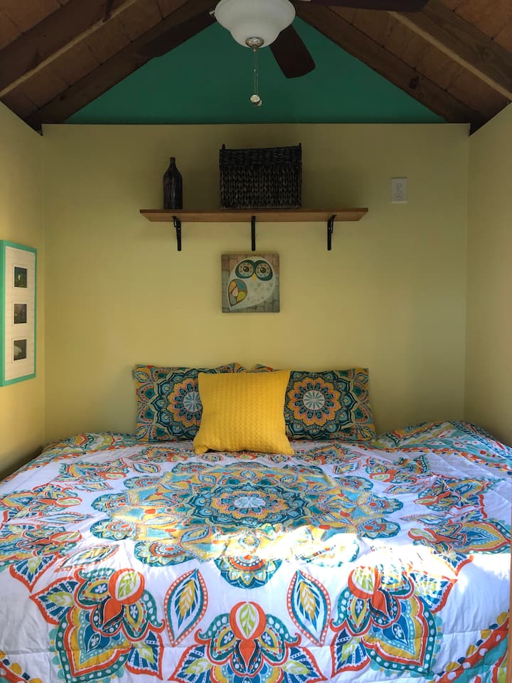 The Tree house (available for an additional ~$40/night) and has a comfy queen bed!