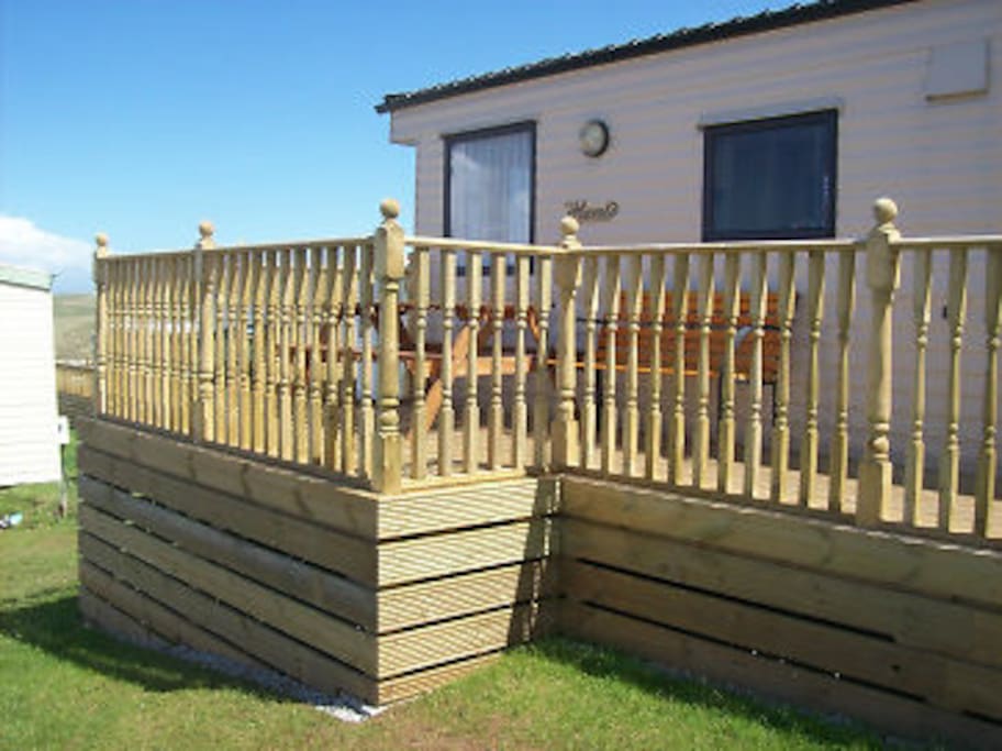 Decking, with sea view.