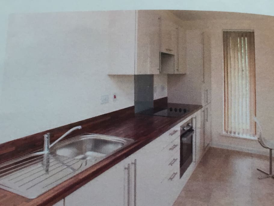 New fitted kitchen with fridge, freezer and washing machine