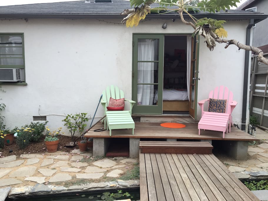 Deck outside one of the bedrooms over a koi pond.