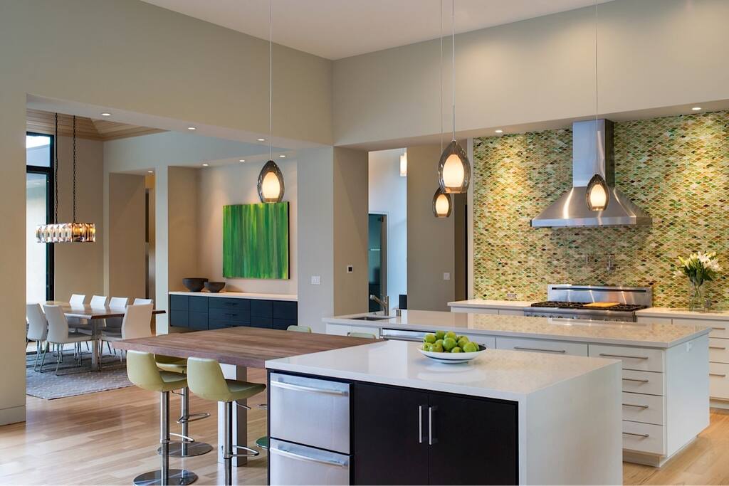 Spacious Great room that joins kitchen, living room, bar, and patio