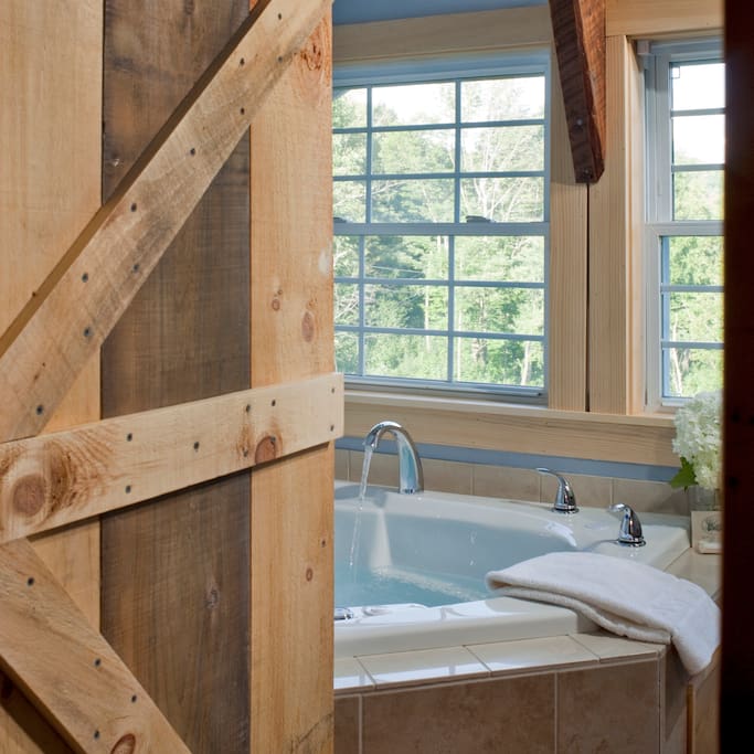 The entrance to the Logan Suite spa bathroom with heart shaped double air tub