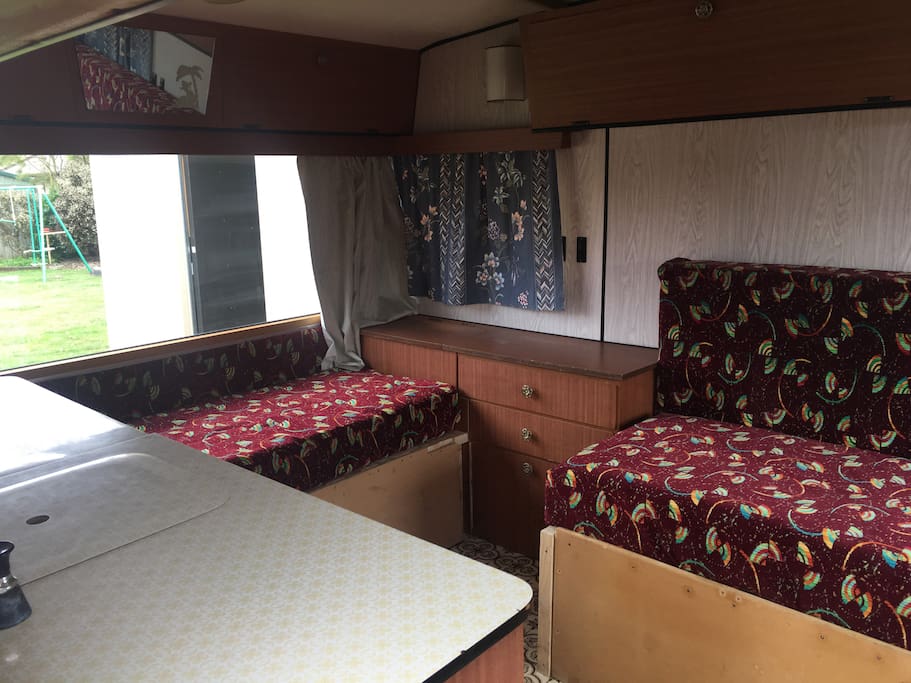 Single bed by front window