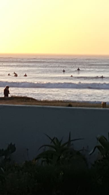 Surfing at sunset