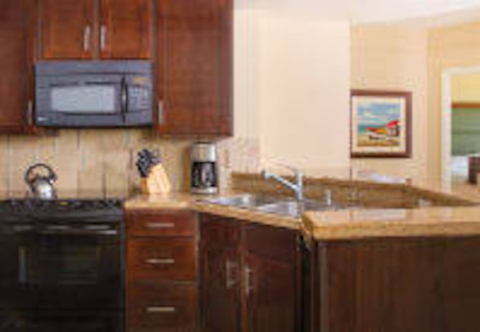 Villa Kitchen
The fully equipped kitchen in your Aruba villa rental features full-size appliances to prepare savory, home-cooked meals for you and your family.