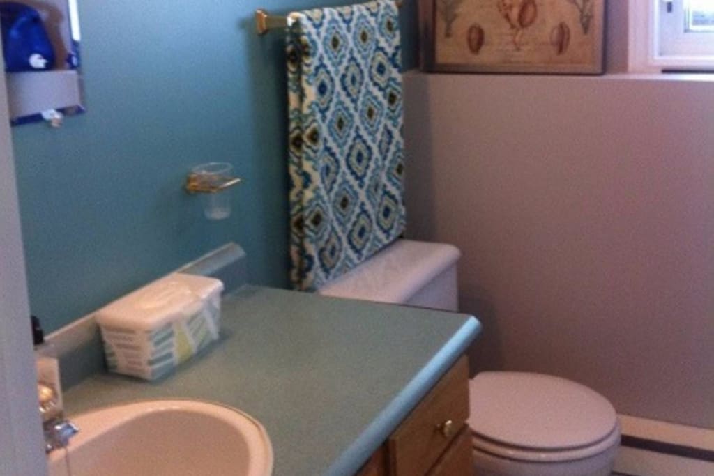 Washroom with Shower and washer and dryer.