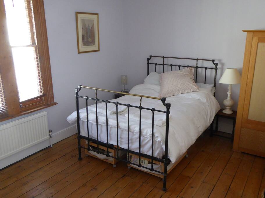Spacious bedroom with double bed