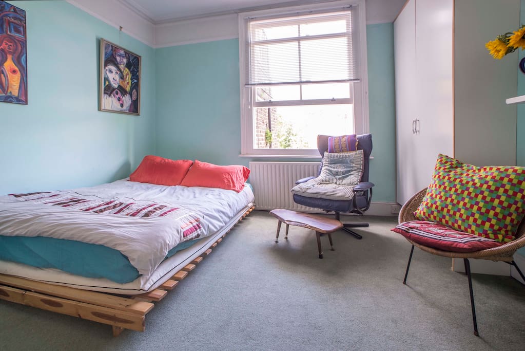 Main double bed with large cupboard, seats & central heating.