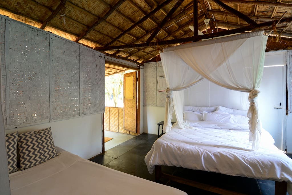 The Bedroom with High Quality Super soft Mattress and Bed Linen, Along with Mosquito Net, Jutex Hemp Rugs to ensure the most comfortable sleep