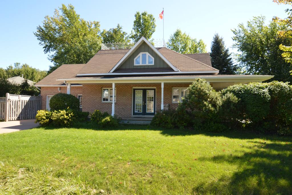 The bungalow farm style chalet is built from brick and has a wrap around deck covering 2 sides of the house for you to sit out and enjoy sunsets or listen to the sound of silence. Located on a quiet dead end street, the chalet is perfect for some R&R.