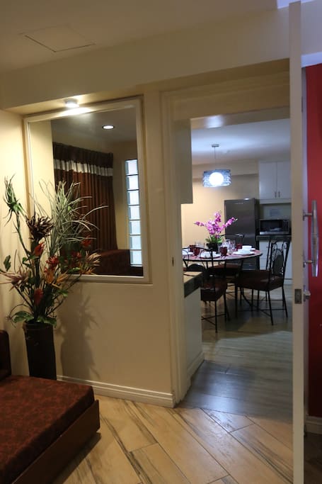 This is the door that leads to the dining room and kitchen.