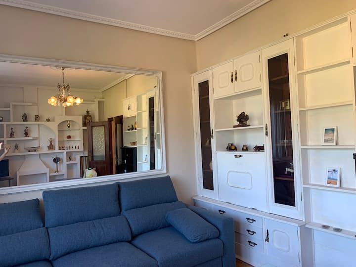 Salón con sofá cama