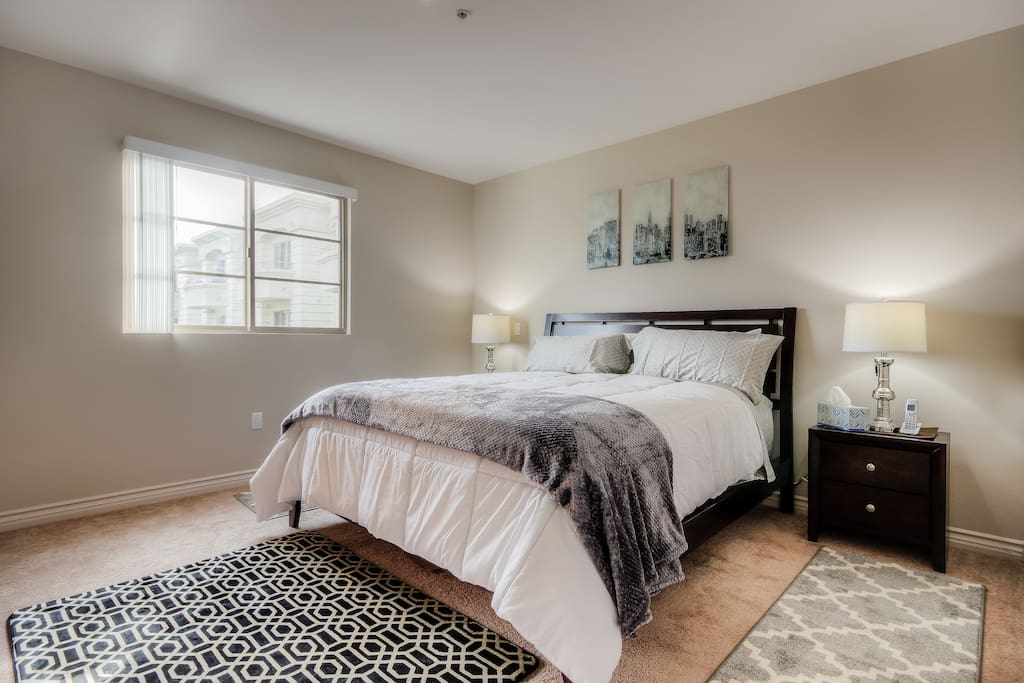 Cal King size bed with new/comfort mattresses