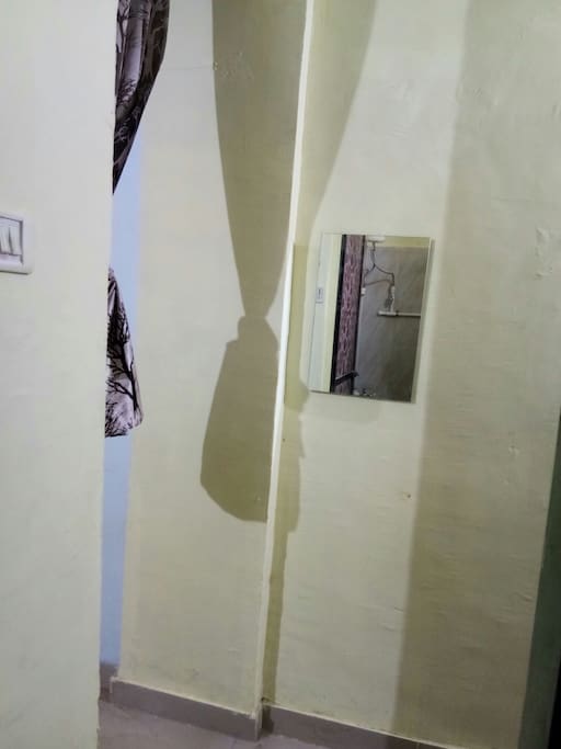 Mirror in front of Bathroom