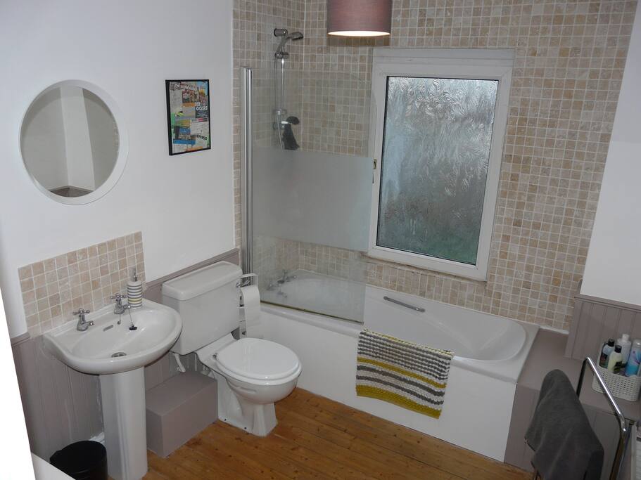 Large upstairs bathroom next to your room - toilet, basin, bath and shower