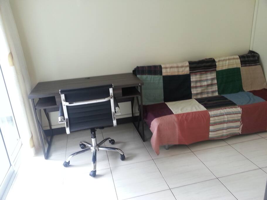Study Room Or Guest Room with Sofa Bed With Attached Bathroom. This is used as the 4th bedroom and the sofa bed can be open up to a single bed