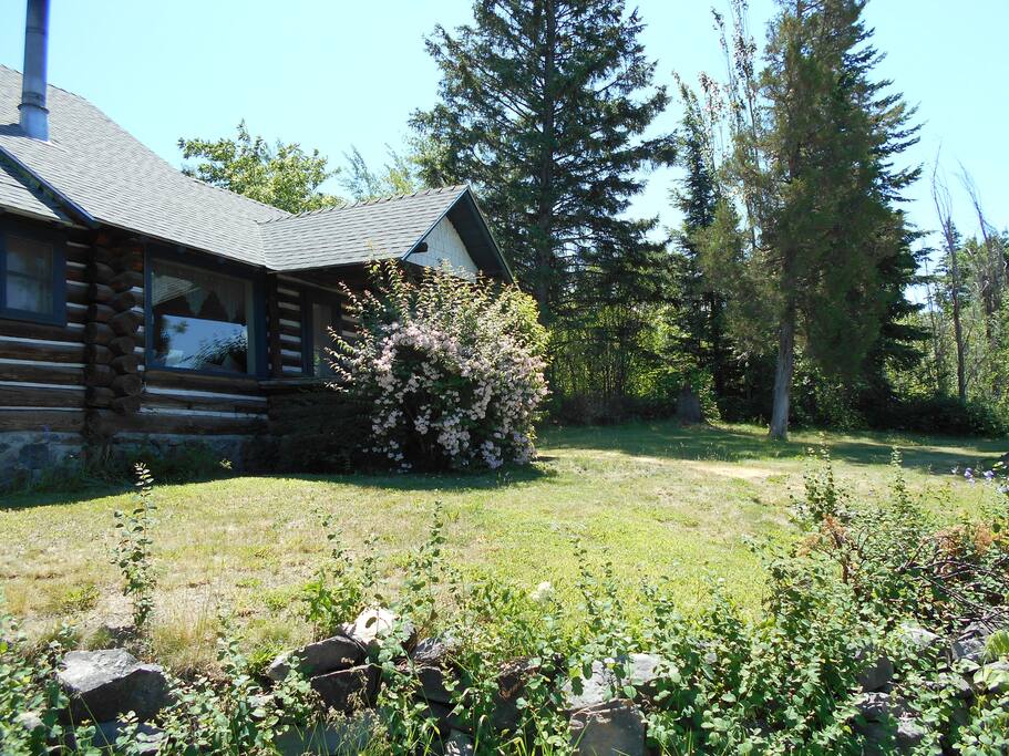 The log cabin portion of the house is about 100 years old but the entire house has been remodeled.