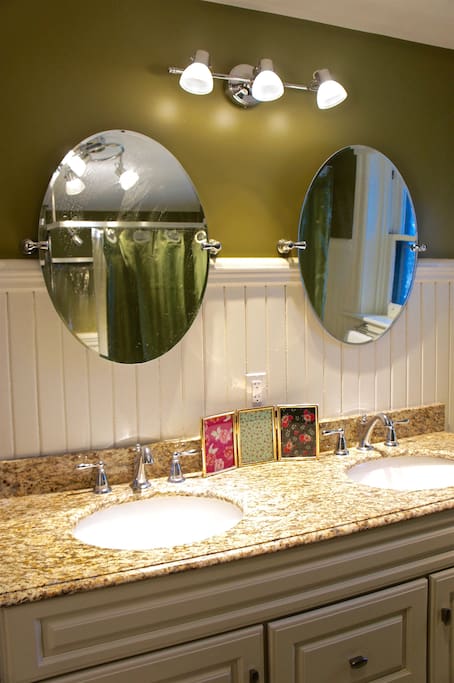 Shared Bathroom with Double Vanity Sink.