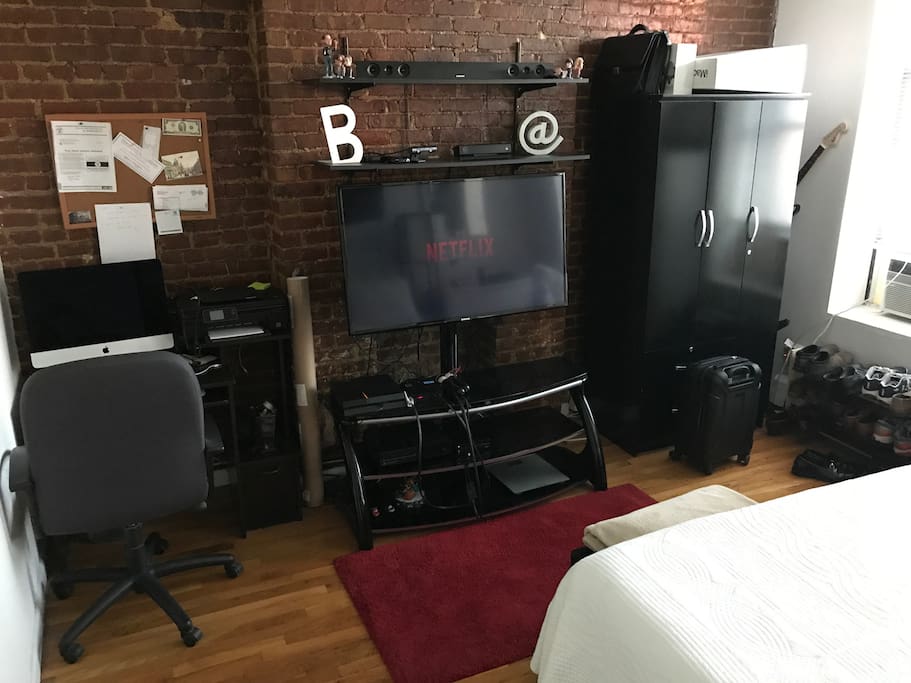 TV (in front of the bed)
