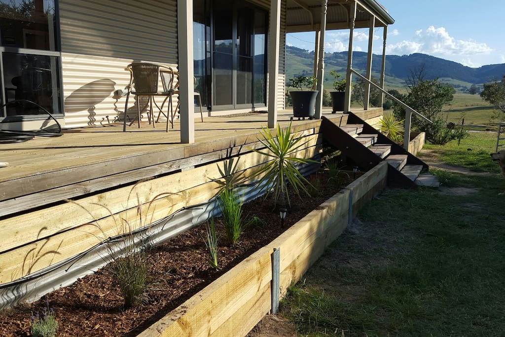 Nice veranda along 2 sides to sit and relax and watch the kids play and the cows graze.