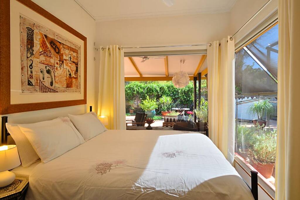 Queen bedroom with views out to the garden.