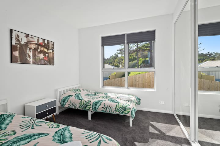 Bedroom 2 with 2 single beds that can be brought together to form a double.

Air conditioning has been installed in each bedroom (installed after photo taken).