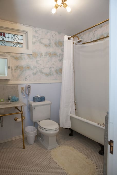 Private bath with original claw-foot tub