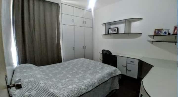 Bedroom with bathroom next door - View 1