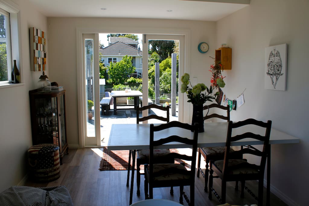Dining room with double doors to outdoor courtyard