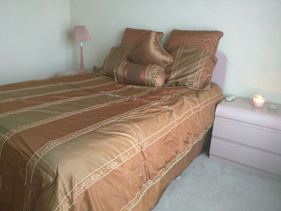Large queen Sleep Number ComfortBed with adjustable firmness & matching comforter and pillow set.