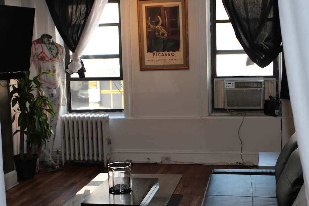 The living room facing 10th Ave...
