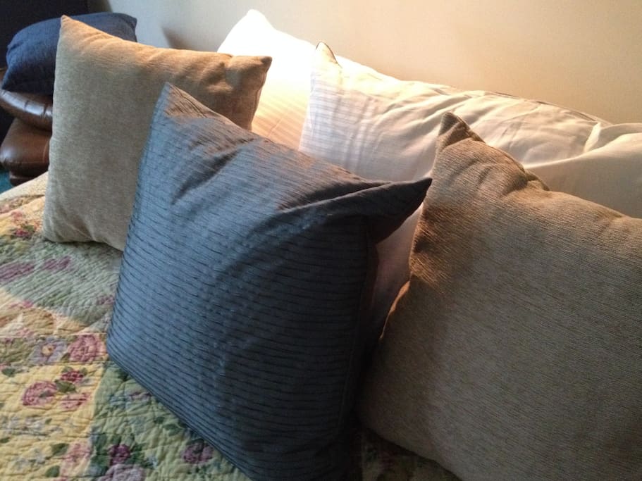 Several Pillows, Quilts, and Blankets