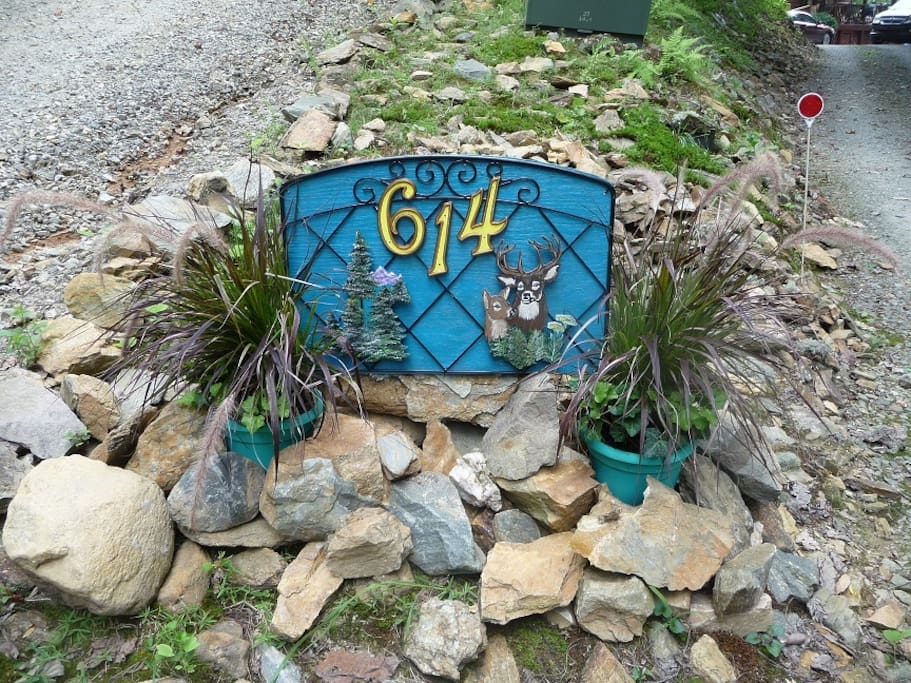 The first thing that you will see is the house number sign that my beautiful wife made by hand.