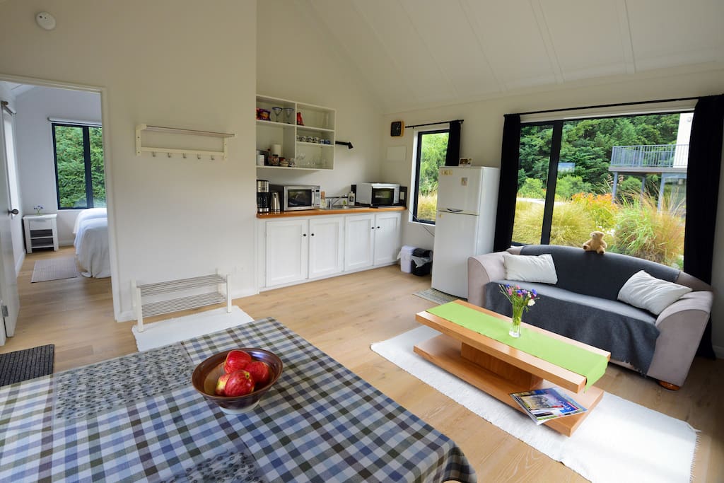 iki Lodge Cottage kitchenette and living space
