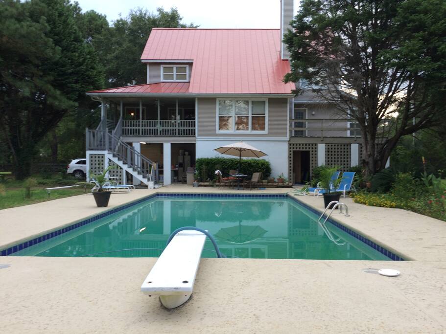 Relax at the pool and watch the sunset.