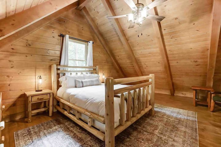 The large loft bedroom has a queen bed and ample storage space in the double dresser.  There is also a crawl space to store any luggage.
To help make travel with kids easier, we have a pack n play and baby gates available for use if needed.
