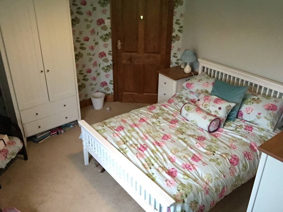 Double bed, wardrobe and desk