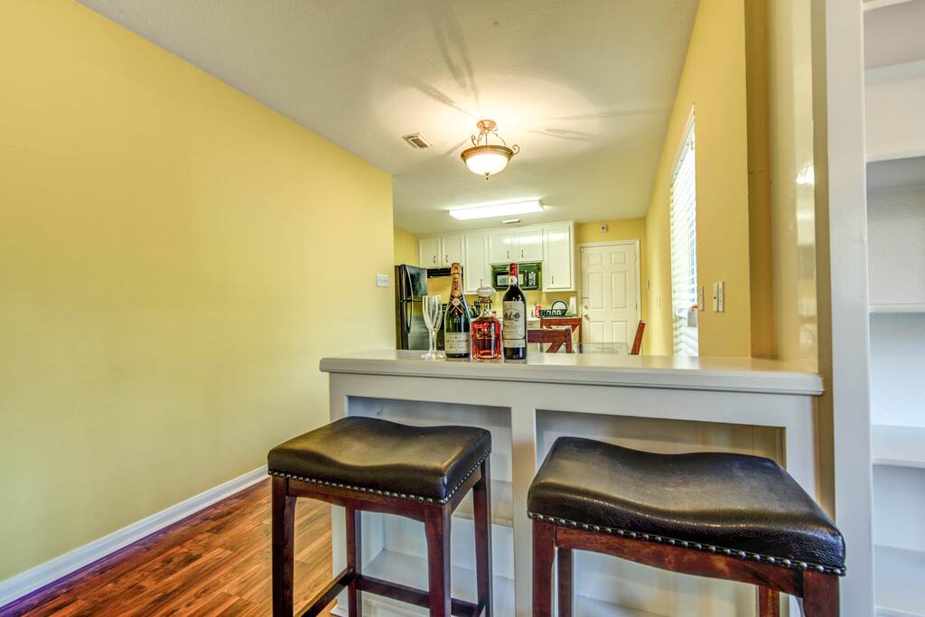 bar area for dinning or drinks, complimentary bottle of wine for our cherished guests.
