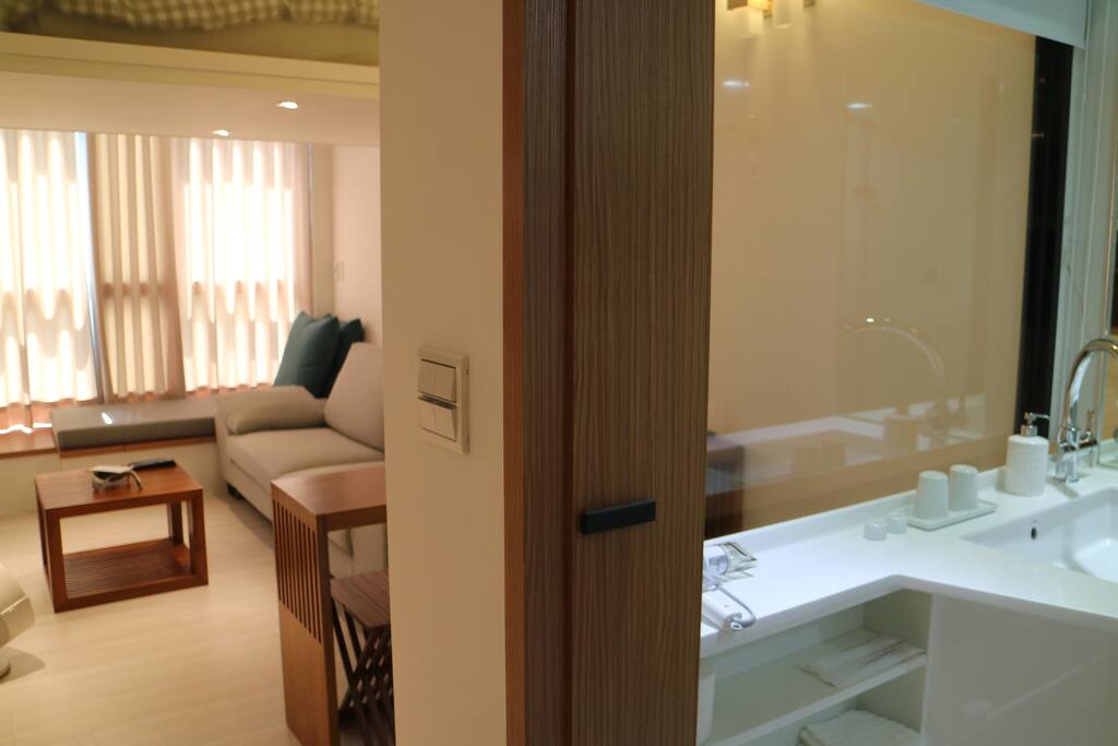 View #2: Spacious view of the ground level living room area and bathroom