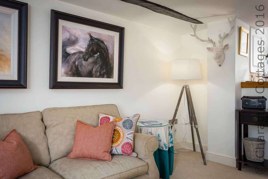 Lovely furnishings complement the traditional character of the property