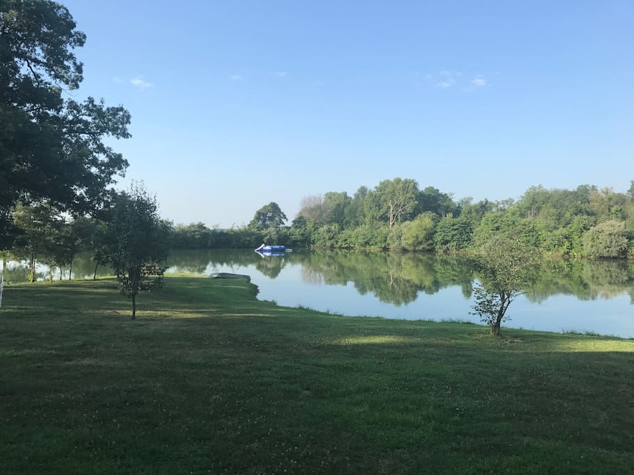 Water trampoline on private lake with life jackets available on site.