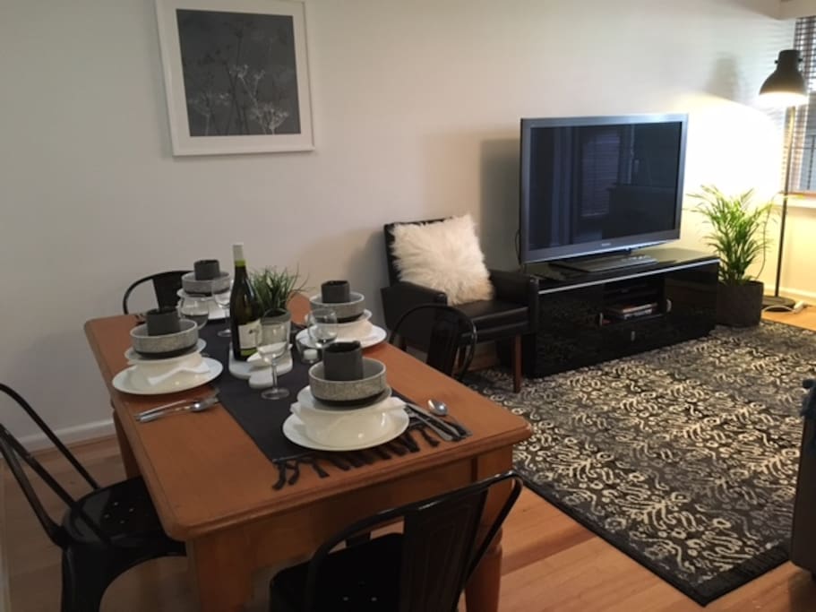 Attractive and stylish lounge and dining with floating timber floorboards