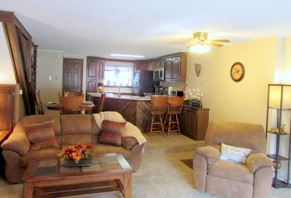 Living room with view of kitchen