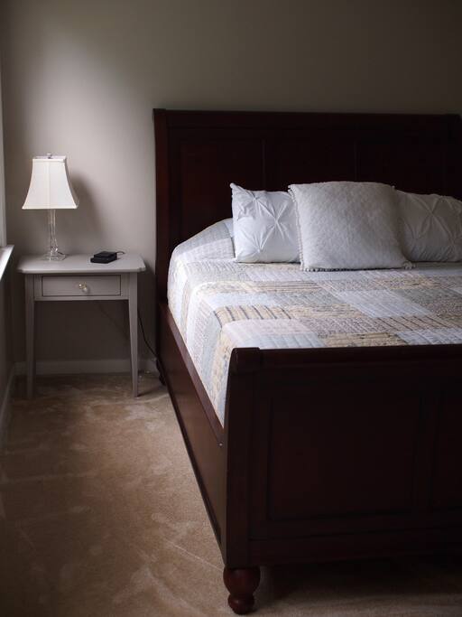 the queen room ensuite with a queen bed